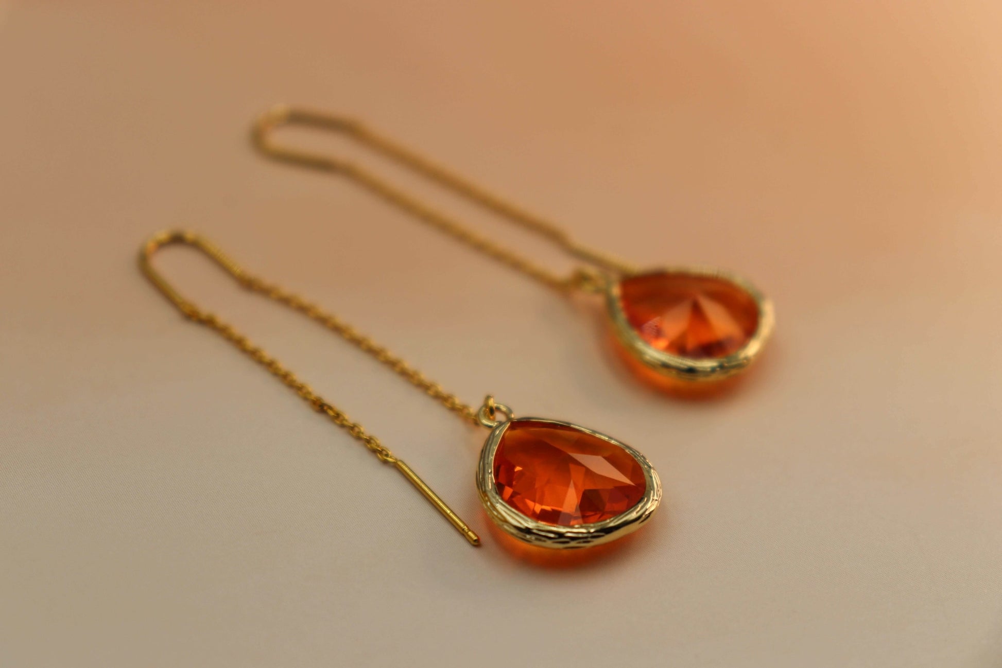 עגילי טיפה כתומים מג'יק סנרייז Princess K Jewelry